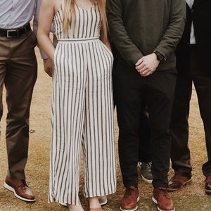 grey and white stripped jumpsuit with pockets